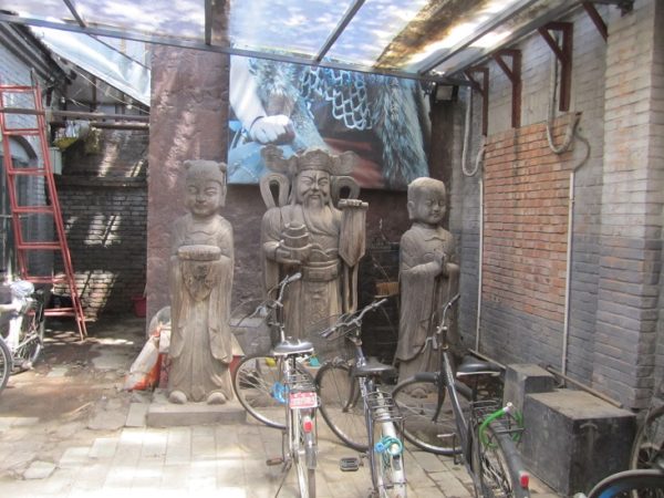 These statues were in a side alley people park their bikes in. Does this work matter?