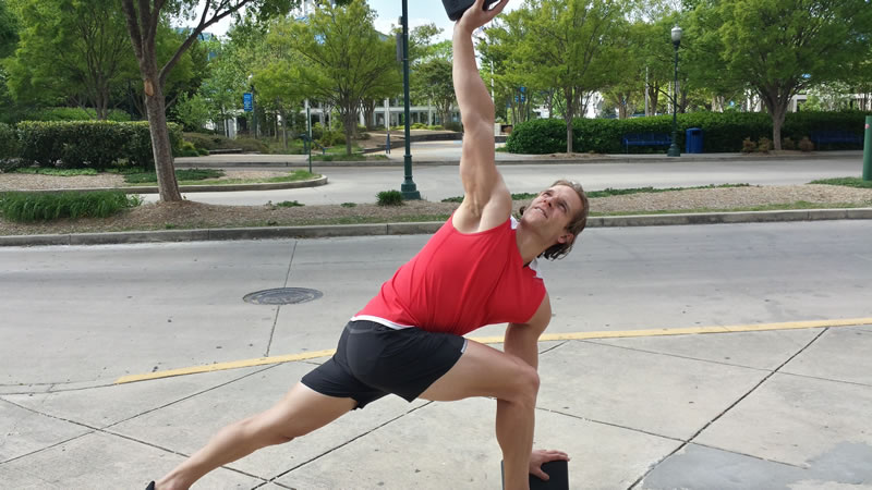 Trainer Kyle House takes my workout outdoors. He likes to mix training for clients by incorporating yoga, weights, and cardio in creative and fun ways.