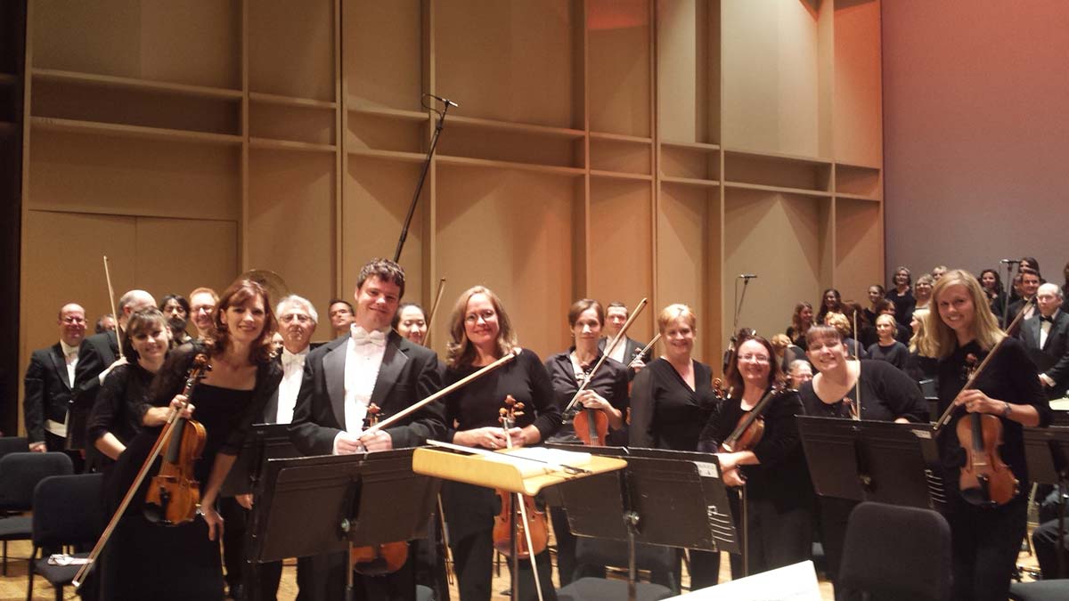 Group photo of the Chattanooga Symphony & Opera violin sections.